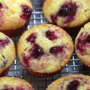 Overhead photo of Orange Cranberry Muffins on a cooling rack.