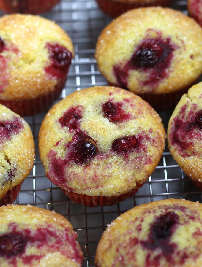 Overhead photo of Orange Cranberry Muffins on a cooling rack.