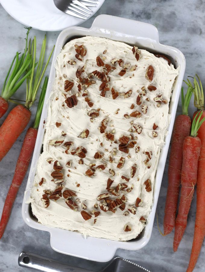 Overhead photo of Old Fashioned Carrot Cake in a white roasting sheet pan.