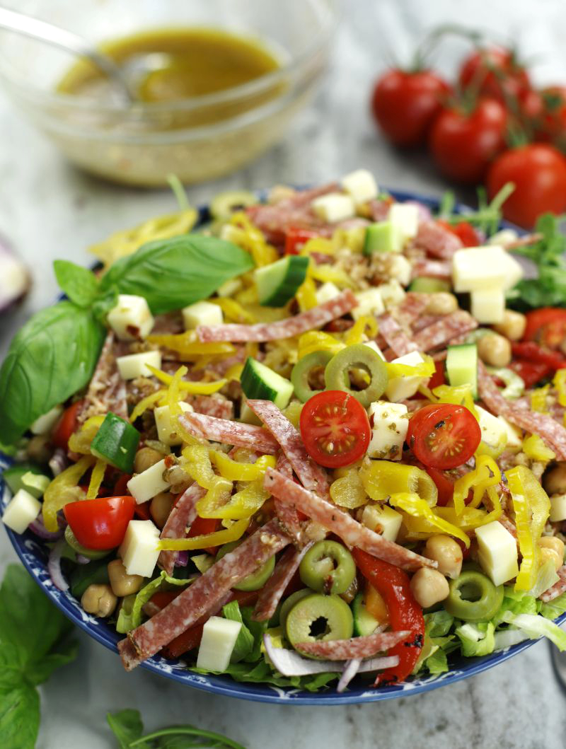 Close up photo of Italian Chopped Salad in a blue bowl.