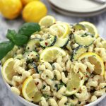 Curly Pasta with Ricotta and Lemon served with sautéed zucchini and sweat peas.