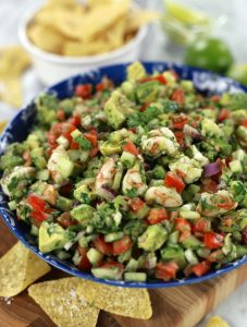 Shrimp and Avocado Ceviche served in a blue Bowl.