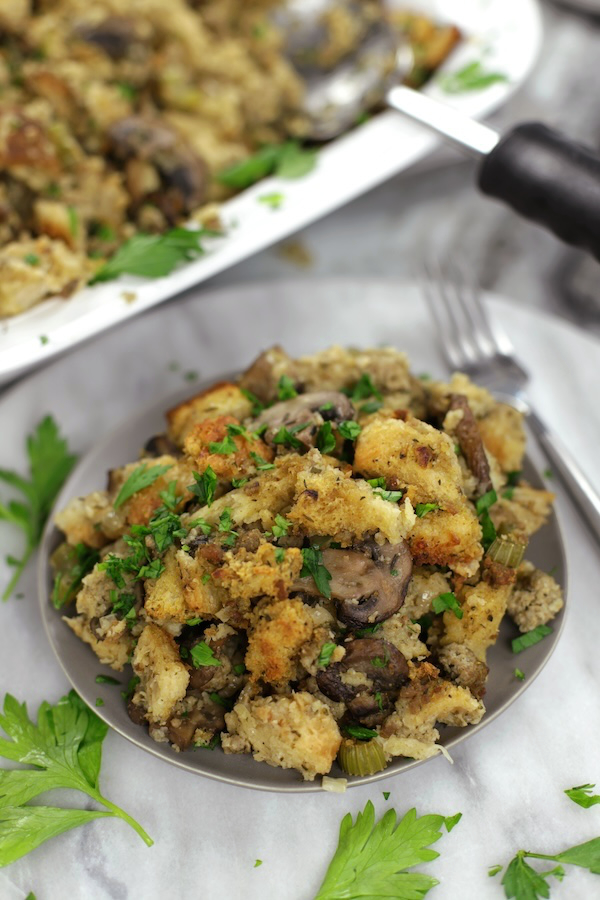 A serving of Sour Bread Stuffing on a small grey plate.